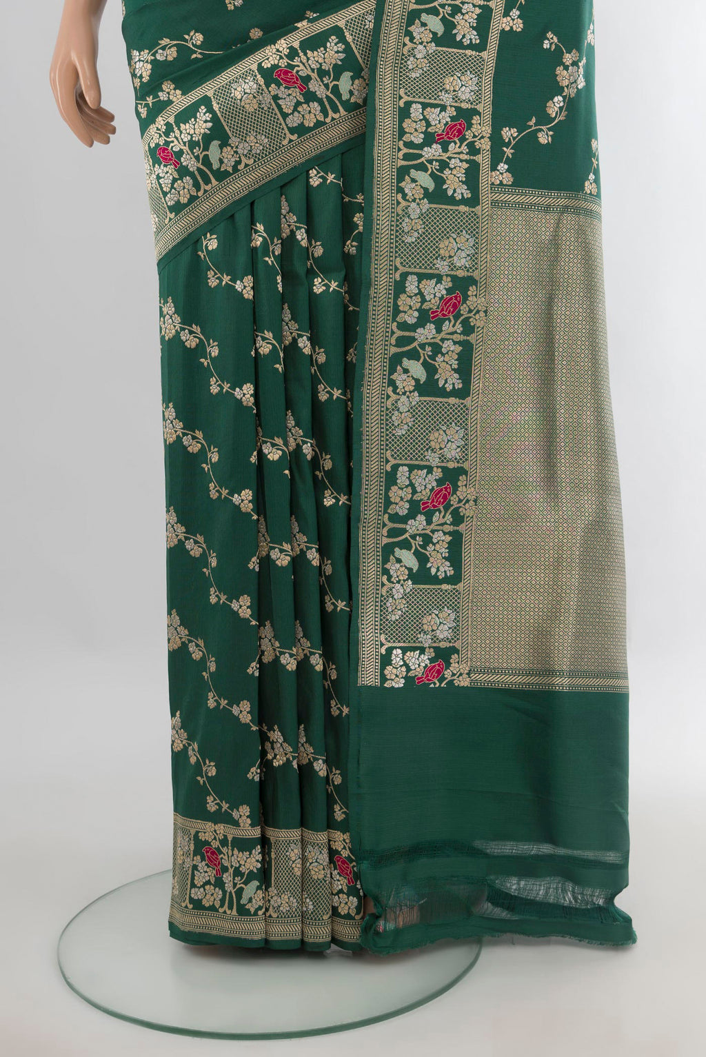 Pleats and pallu of Pure Silk Green Banarasi Saree with Zari Butta on the body and Zari Border. 