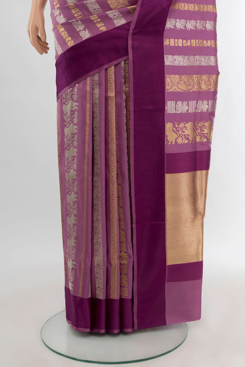 Pleats and pallu of Purple Banarasi Silk Saree with Zari Butta on the body and Thread Border. 