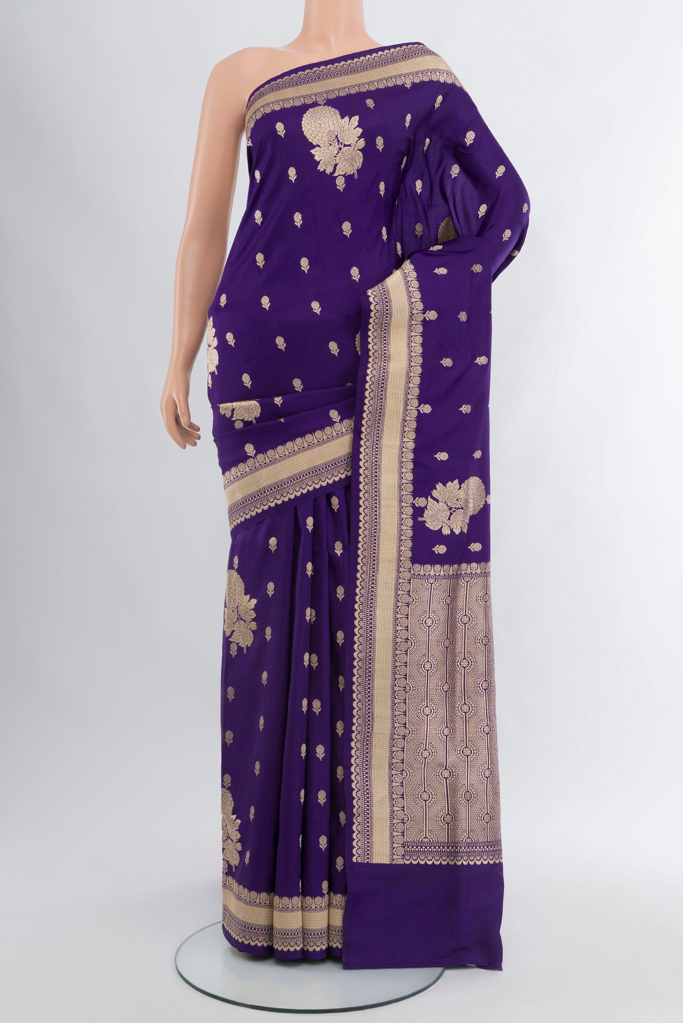 Dark Blue Banarasi Silk Saree with Zari Butta on the body and Zari Border.  displayed on a mannequin