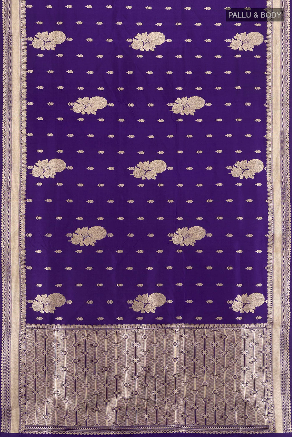 Flat view of Dark Blue Banarasi Silk Saree with Zari Butta on the body and Zari Border. 