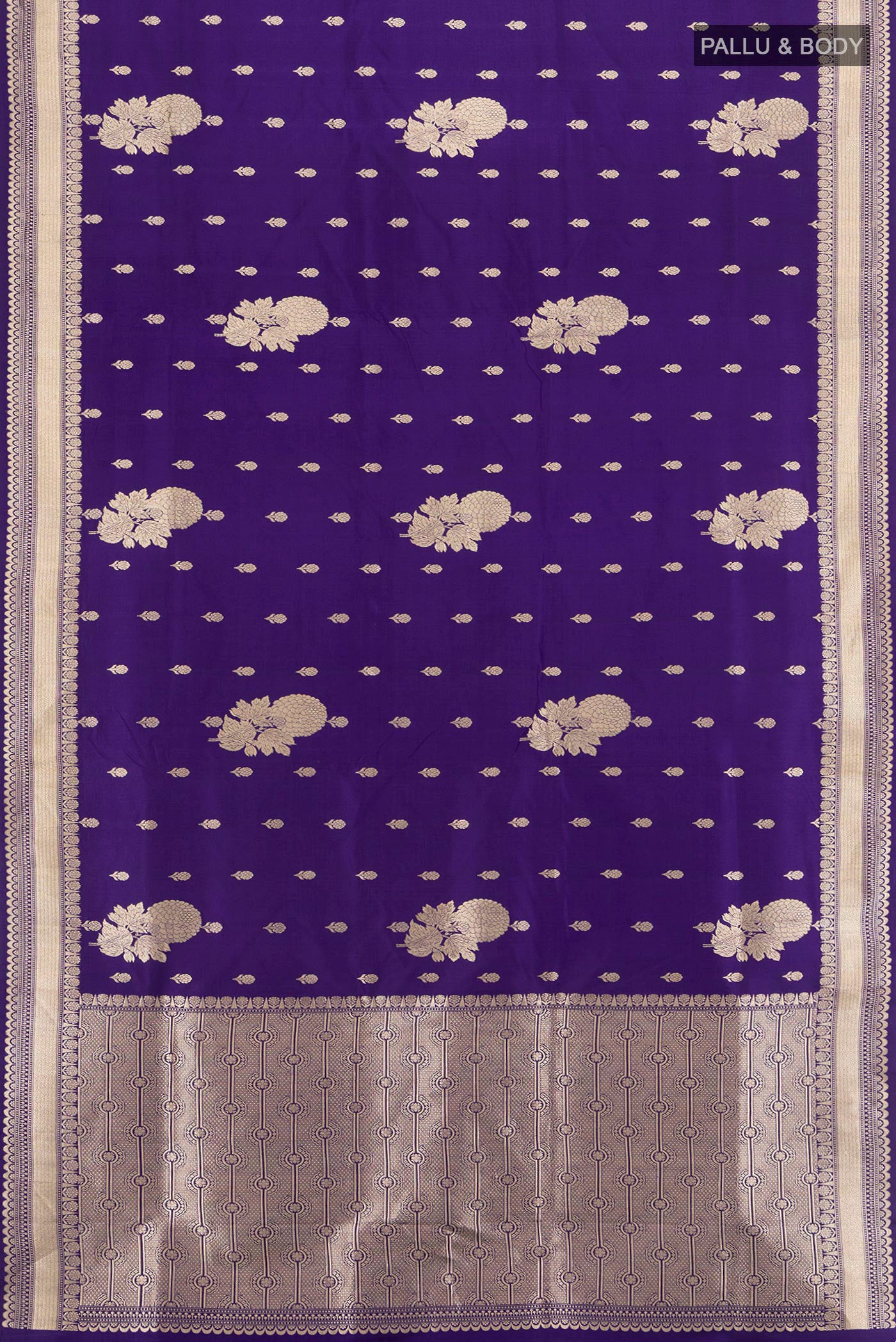 Flat view of Dark Blue Banarasi Silk Saree with Zari Butta on the body and Zari Border. 
