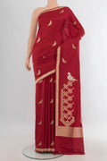Pure Silk Deep Red Banarasi Saree with Zari Butta on the body and Zari Border.  displayed on a mannequin