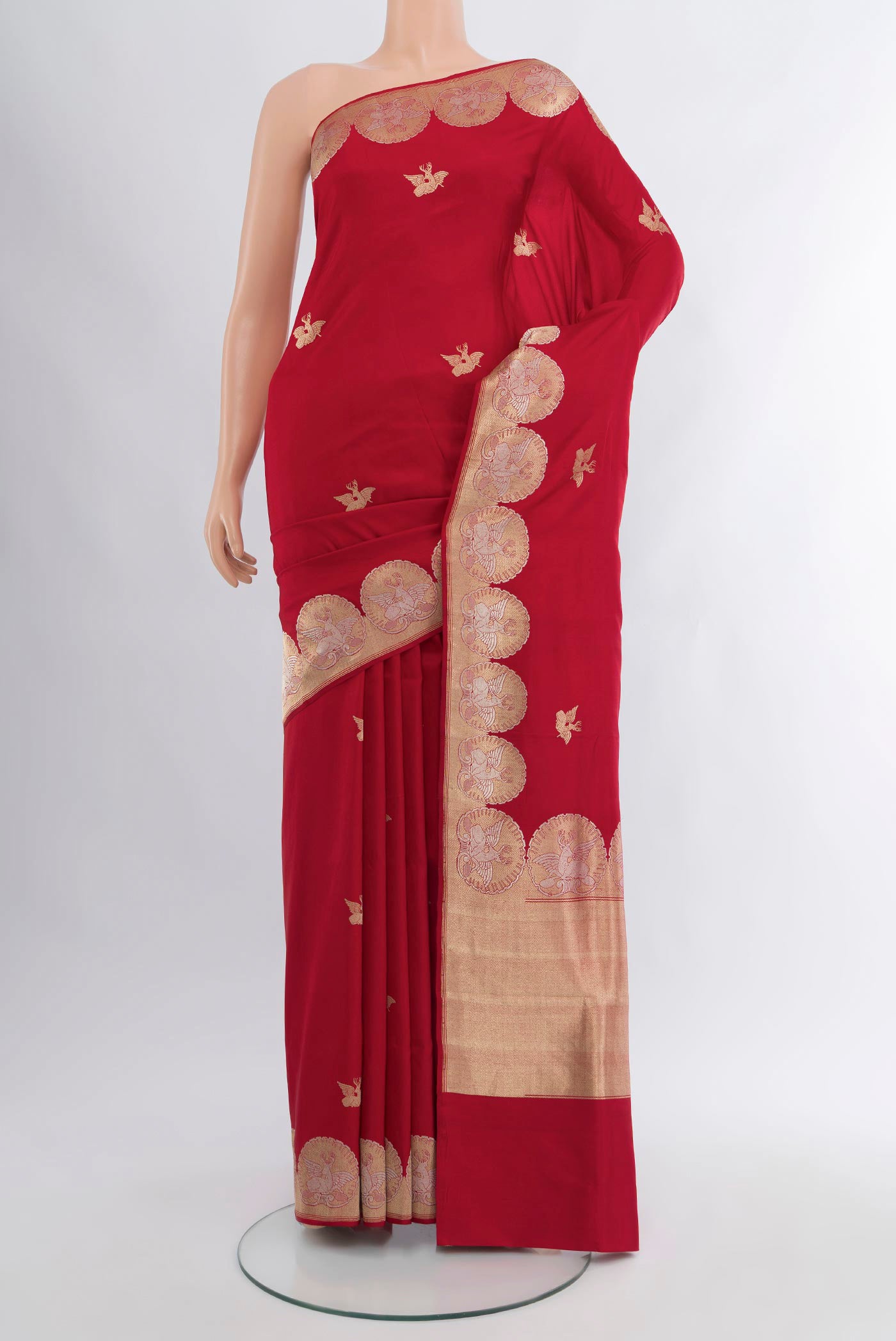 Red Banarasi Silk Saree with Zari Butta on the body and Zari Border.  displayed on a mannequin