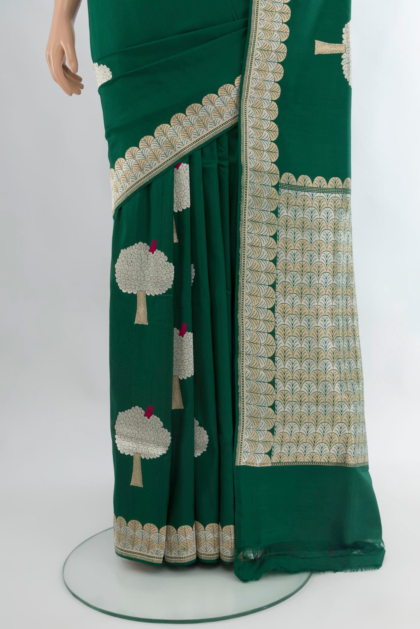 Pleats and pallu of Bottle Green Banarasi Silk Saree with Zari Butta on the body and Zari Border. 