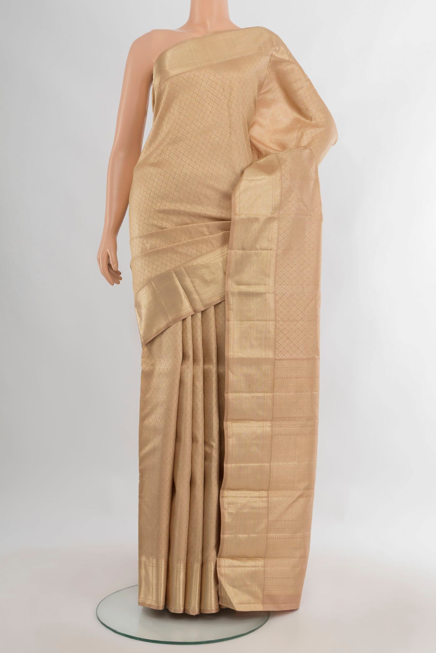 Pure Silk Sandal Kanjivaram Saree with Zari Brocade on the body and Zari Border.  displayed on a mannequin