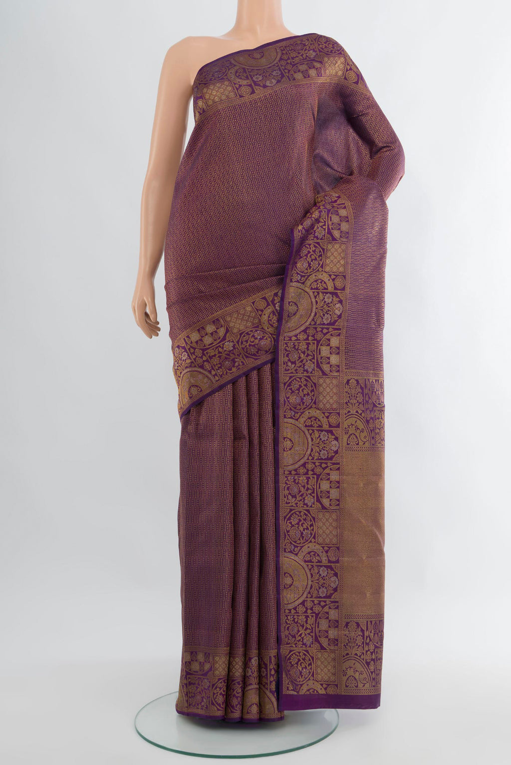 Violet Kanjivaram Silk Saree with Zari Brocade on the body and Zari Border.  displayed on a mannequin