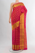 Rani Pink Kanjivaram Silk Saree with Zari Butta on the body and Zari Border.  displayed on a mannequin