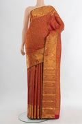 Pure Silk Pure Zari Maroon Kanjivaram Saree with Zari Butta on the body and Silk Border.  displayed on a mannequin