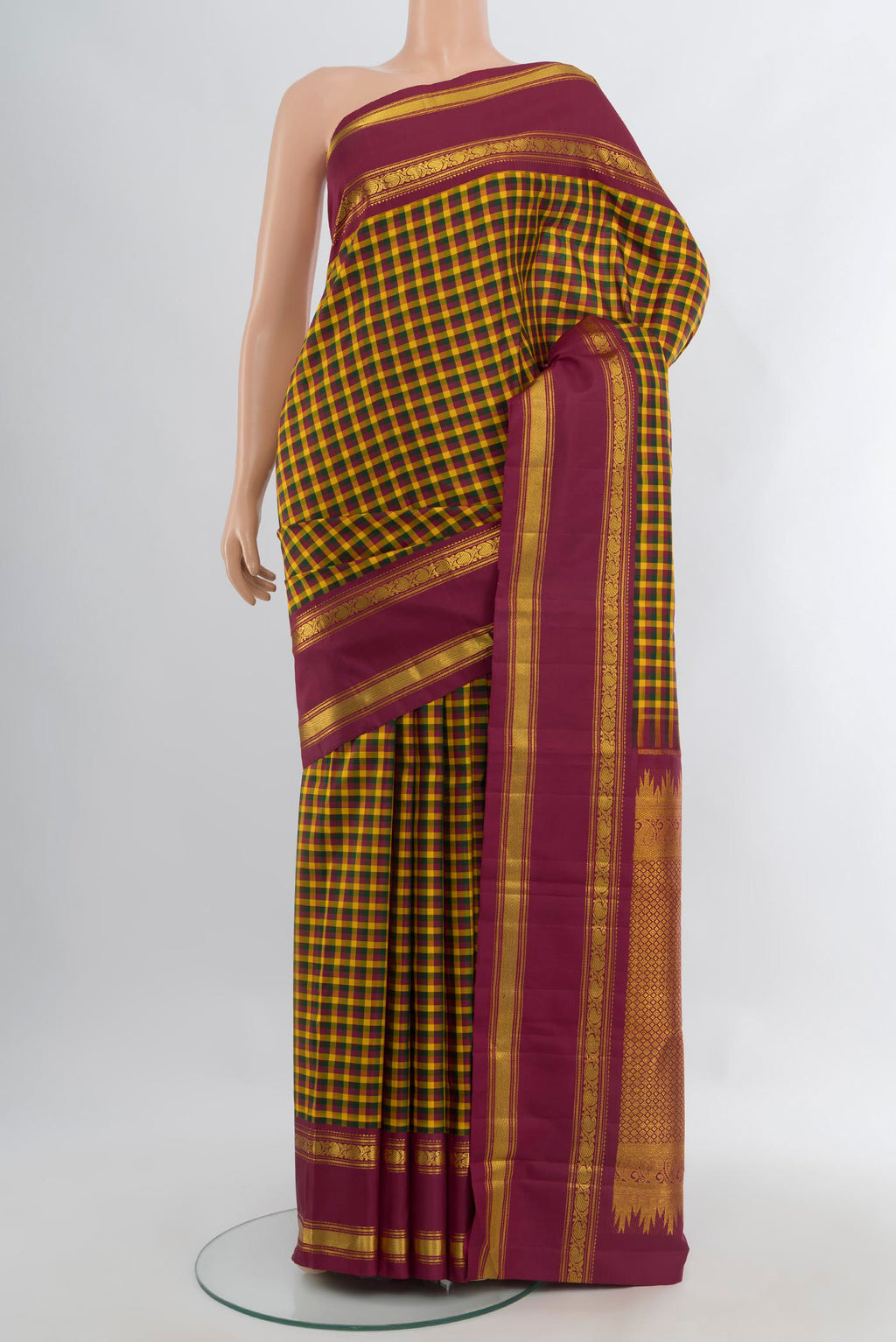 Pure Silk Pure Zari Multi Color Kanchipuram Saree with Checked design on the body and Plain Border.  displayed on a mannequin