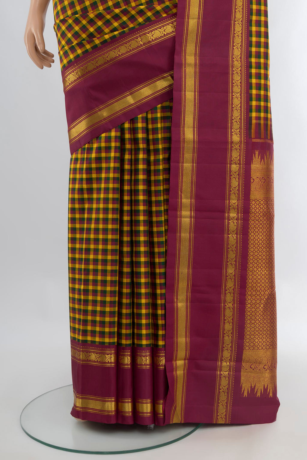Pleats and pallu of Pure Silk Pure Zari Multi Color Kanchipuram Saree with Checked design on the body and Plain Border. 