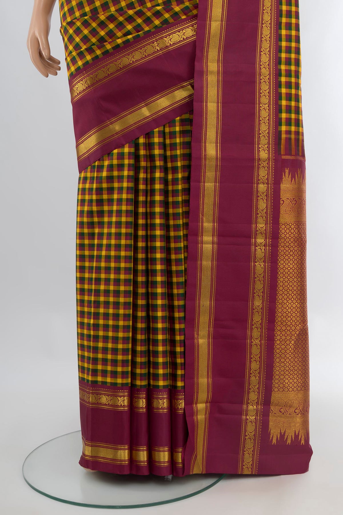 Pleats and pallu of Pure Silk Pure Zari Multi Color Kanchipuram Saree with Checked design on the body and Plain Border. 
