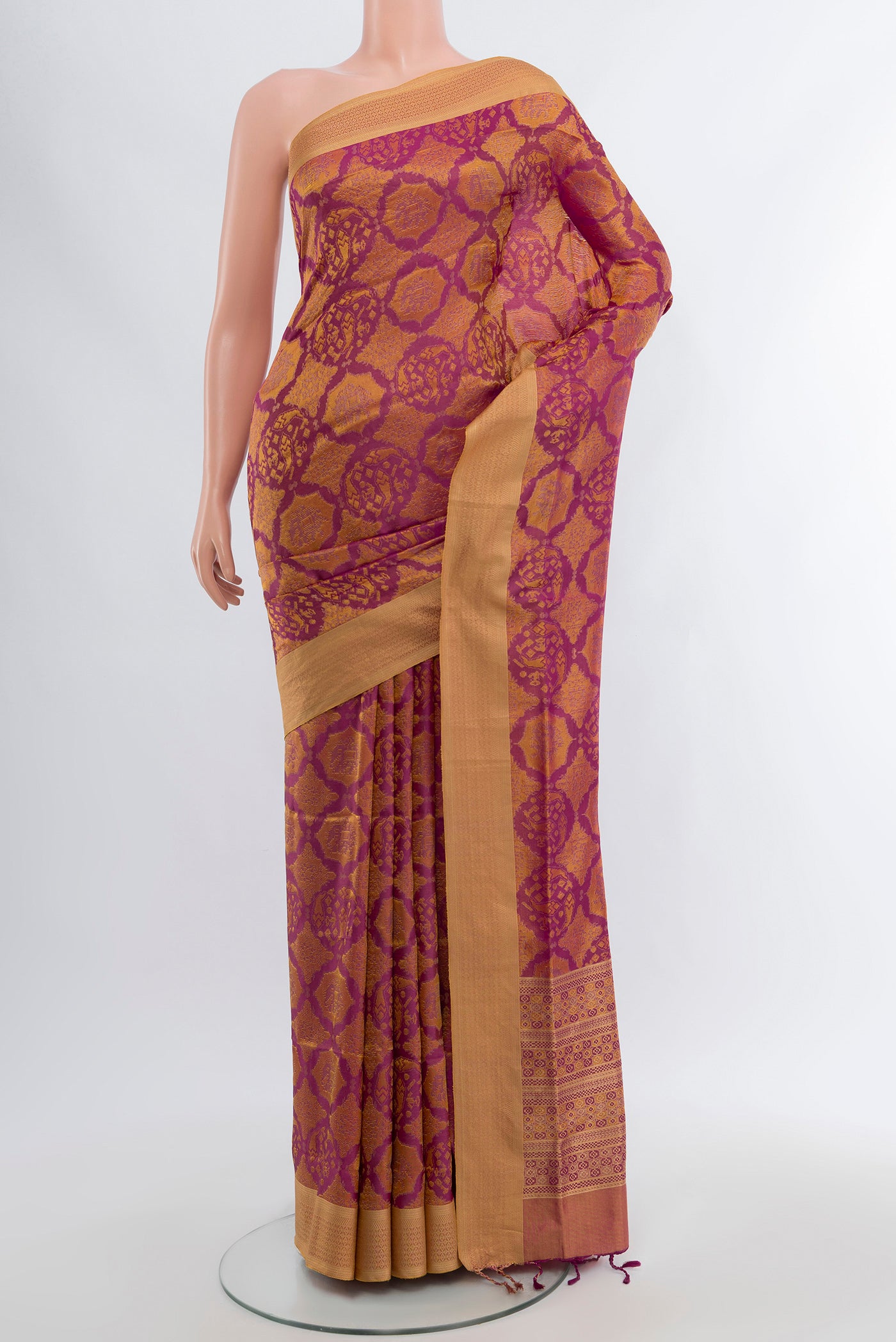 Purple Soft Silk Saree with Zari Butta on the body and Silk Border.  displayed on a mannequin