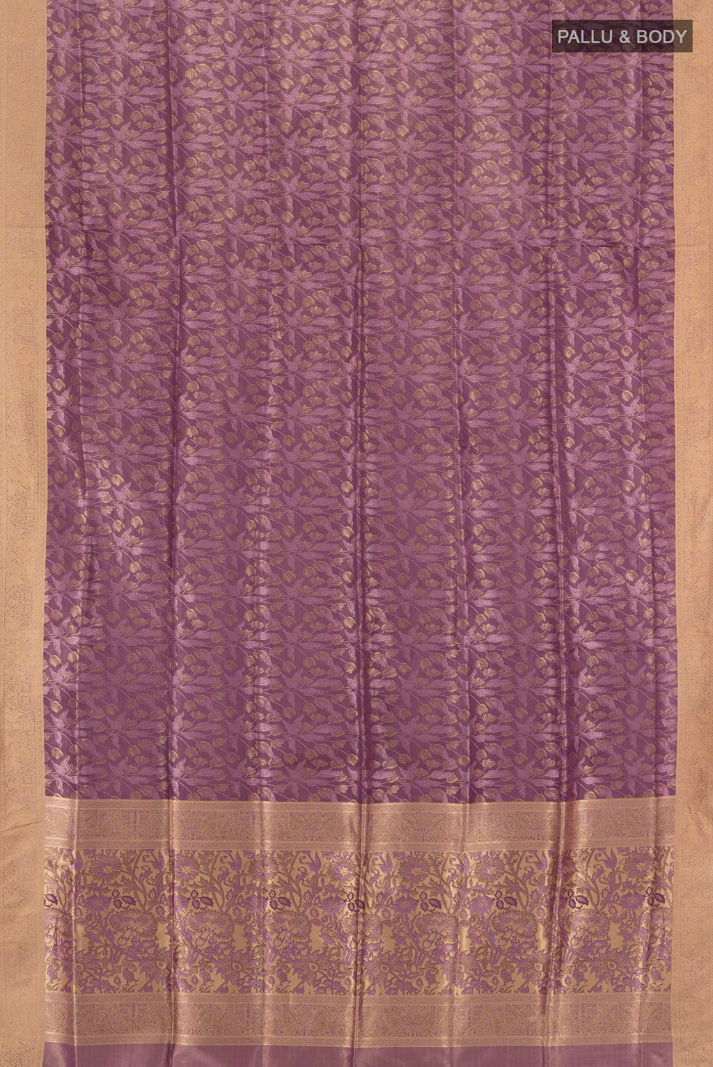 Flat view of Mauve Soft Silk Saree with Zari Butta on the body and Zari Border. 