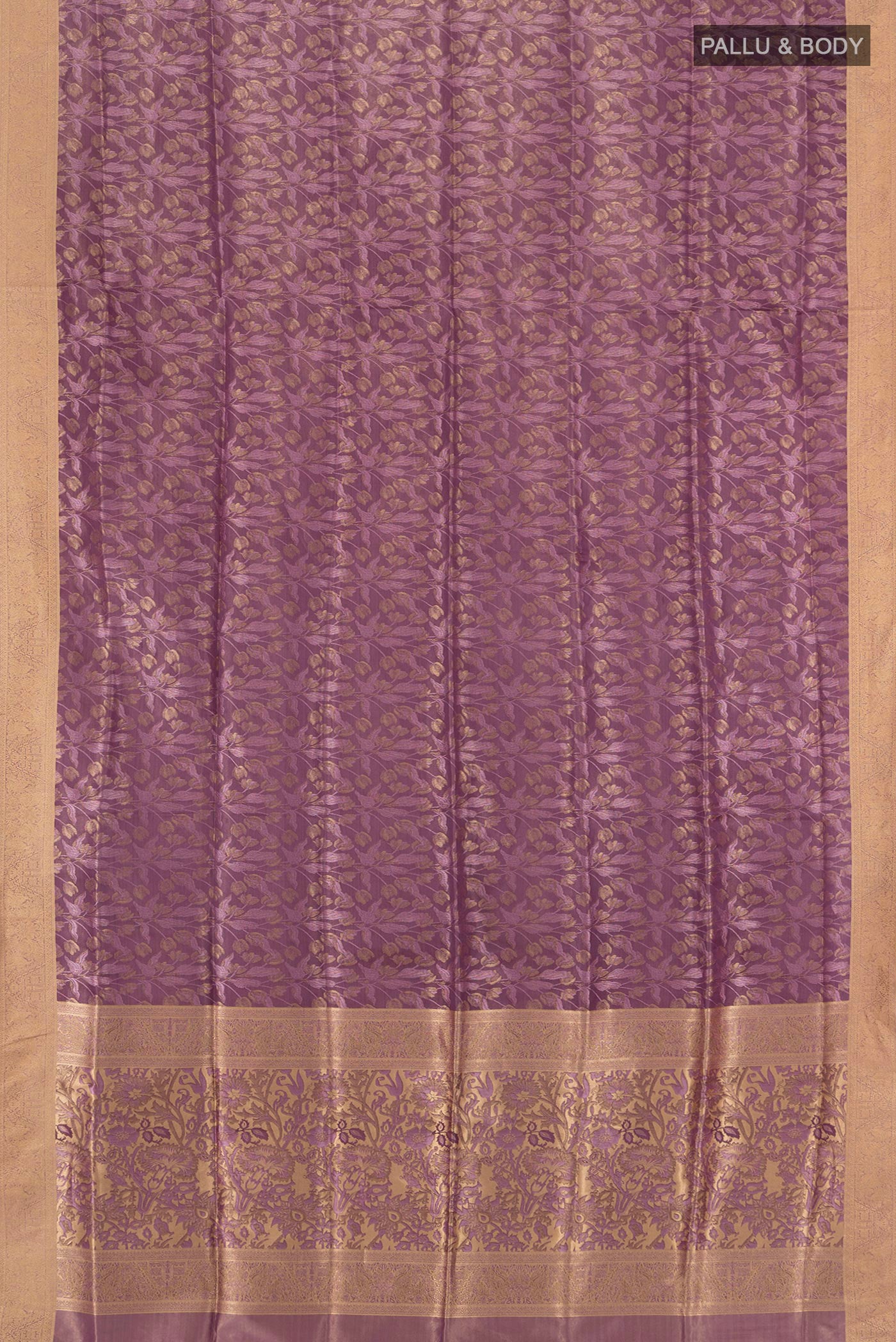 Flat view of Mauve Soft Silk Saree with Zari Butta on the body and Zari Border. 