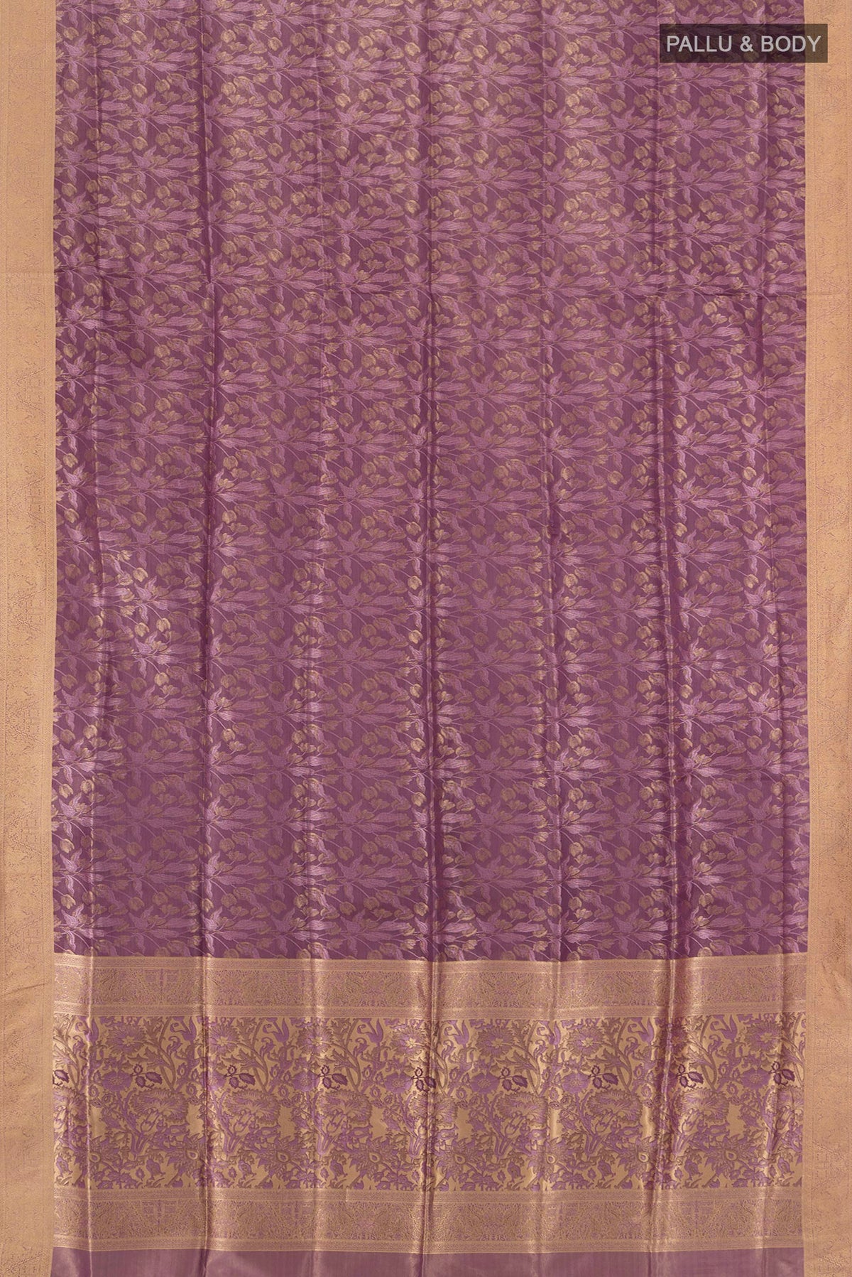 Flat view of Mauve Soft Silk Saree with Zari Butta on the body and Zari Border. 