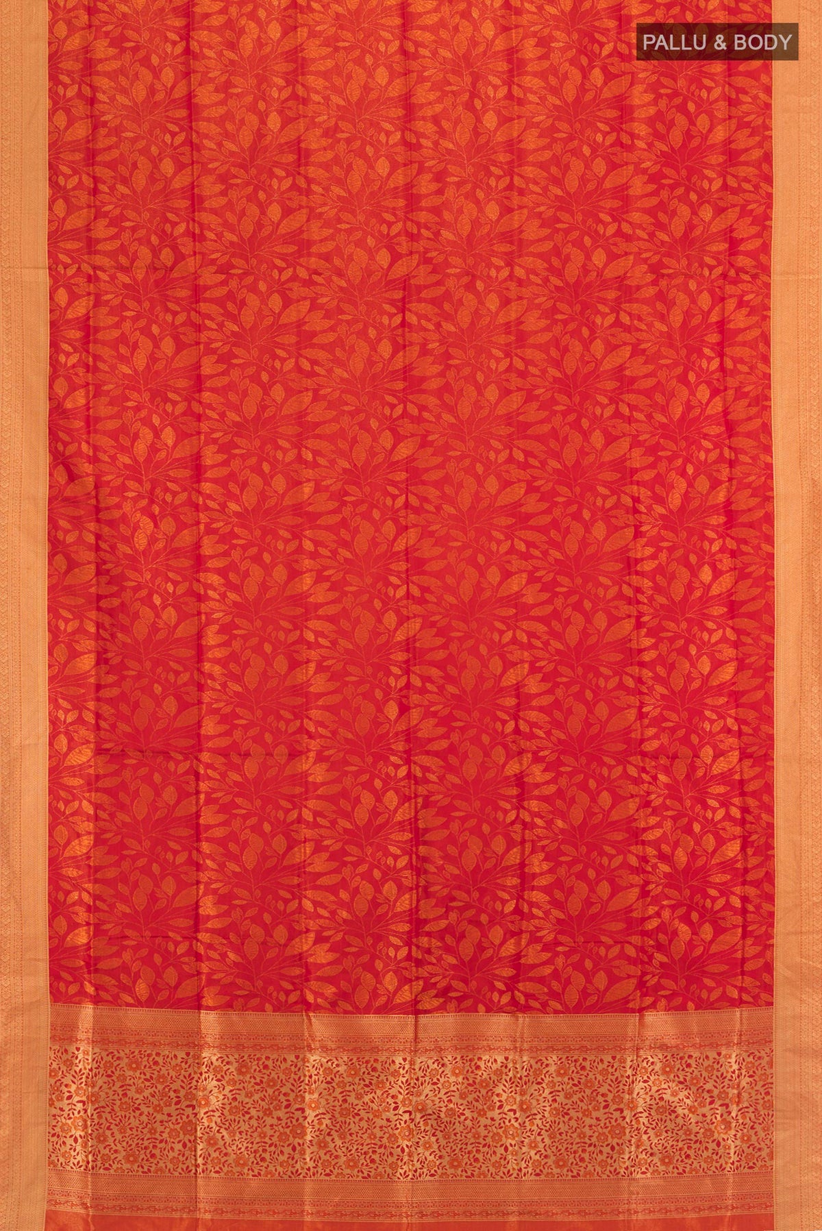 Flat view of Brick Orange Soft Silk Saree with Jacquard design on the body and Thread Border. 