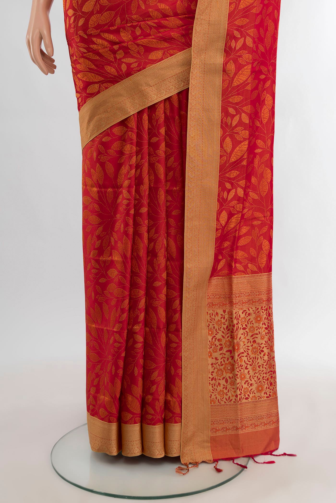 Pleats and pallu of Brick Orange Soft Silk Saree with Jacquard design on the body and Thread Border. 