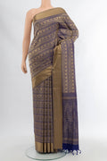 Navy Blue Soft Silk Saree with Thread Butta on the body and Silk Border.  displayed on a mannequin