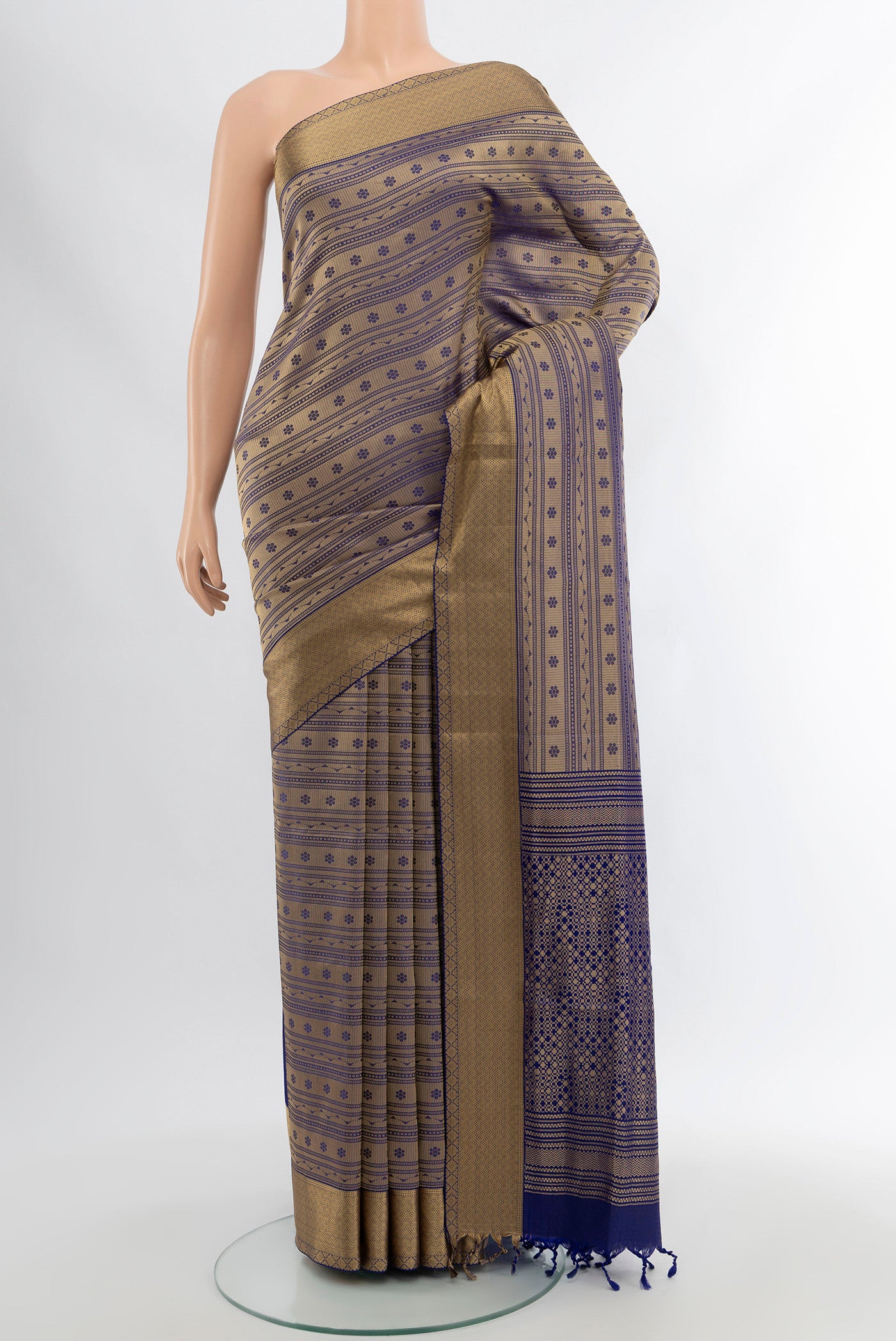 Navy Blue Soft Silk Saree with Thread Butta on the body and Silk Border.  displayed on a mannequin