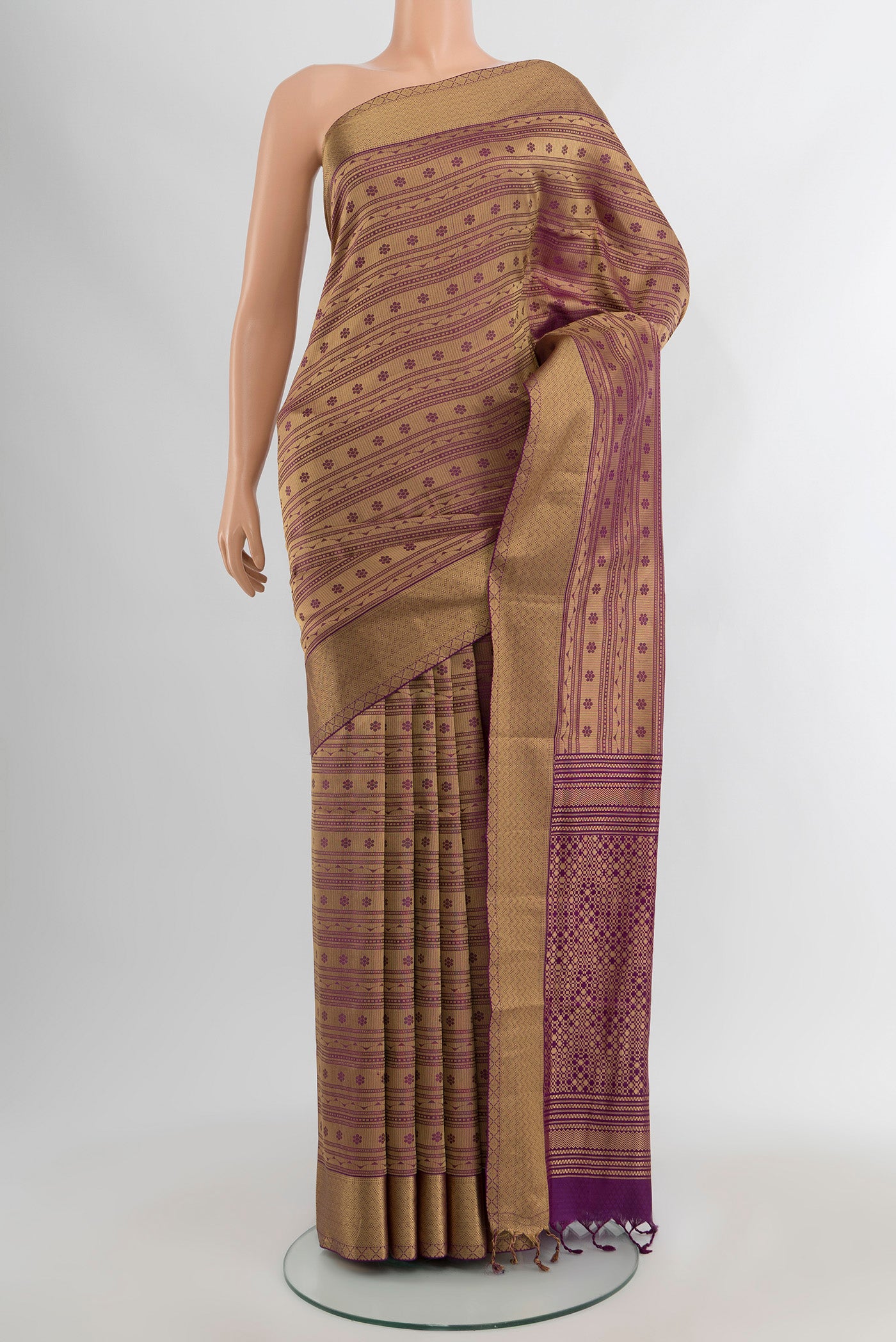 Violet Soft Silk Saree with Jacquard design on the body and Thread Border.  displayed on a mannequin