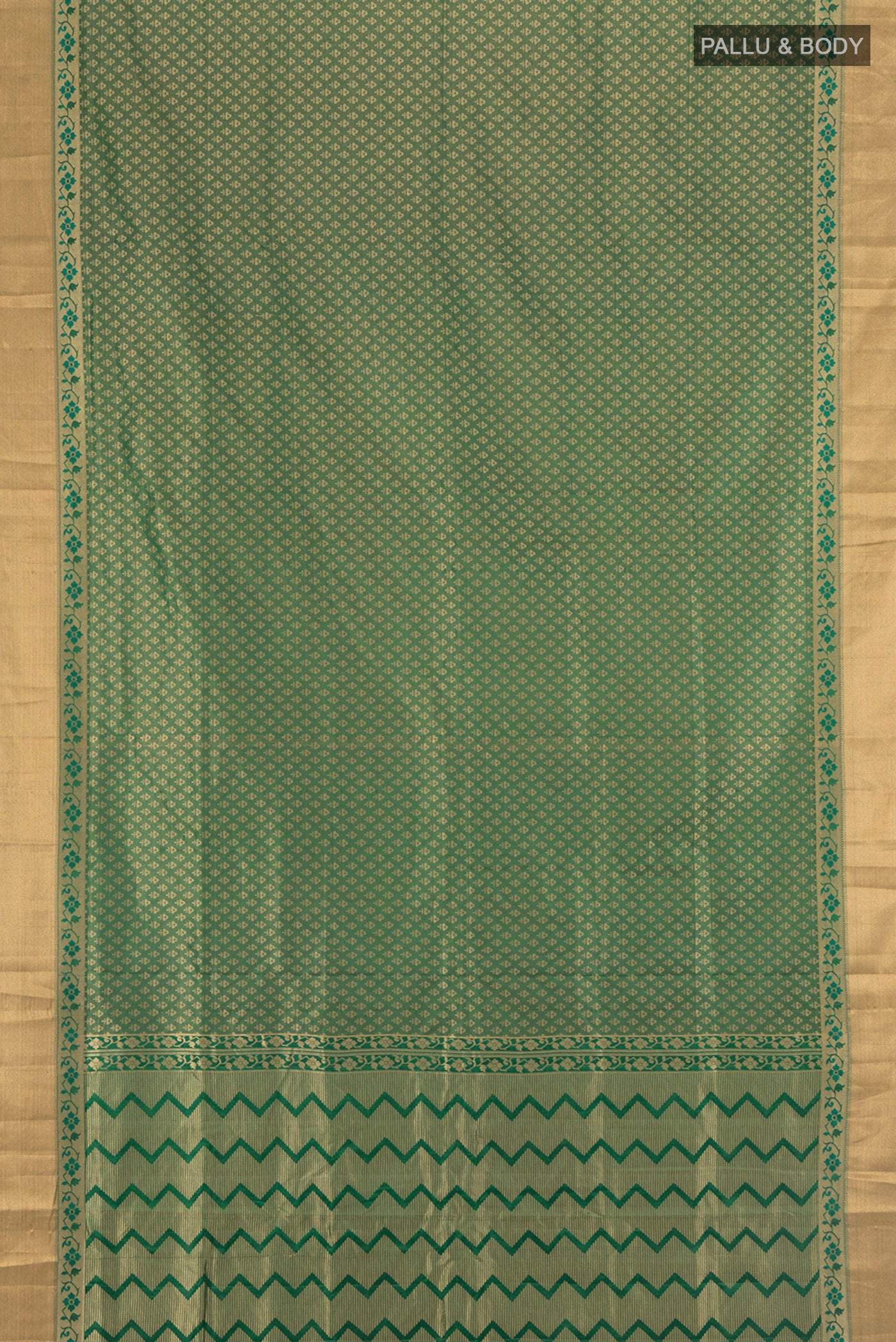 Flat view of Green Soft Silk Saree with Jacquard design on the body and Zari Border. 