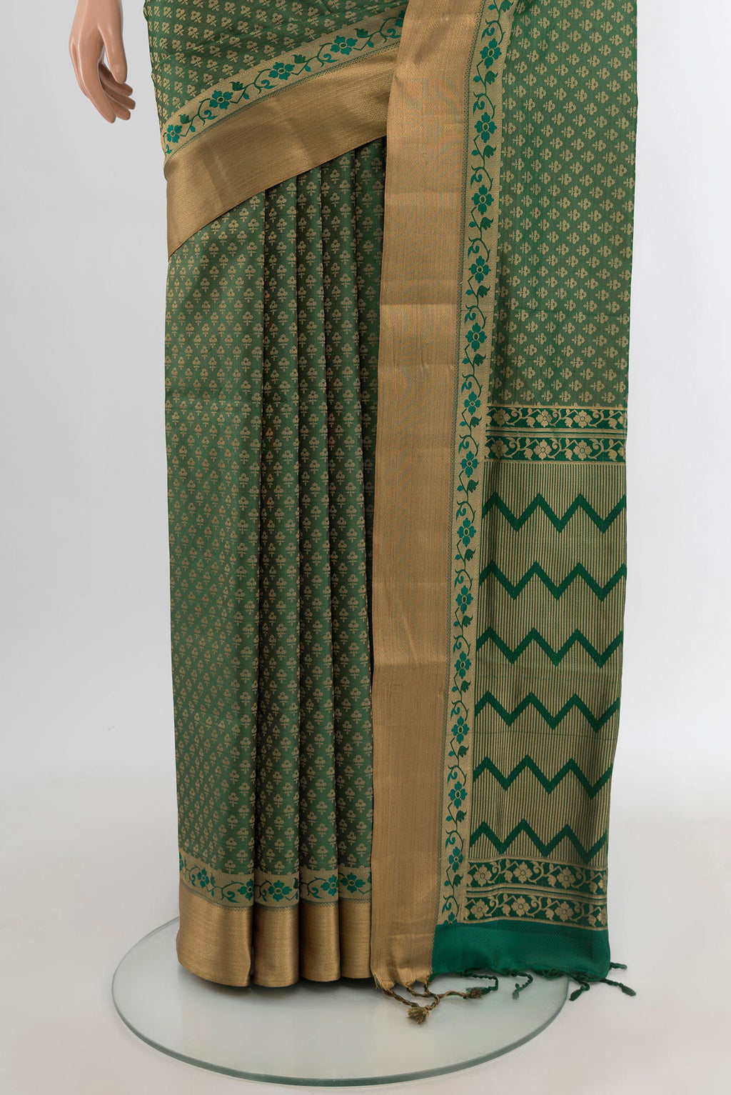 Pleats and pallu of Green Soft Silk Saree with Jacquard design on the body and Zari Border. 
