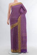 Lavender Soft Silk Saree with Thread Butta on the body and Silk Border.  displayed on a mannequin