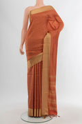 Rust Soft Silk Saree with Jacquard design on the body and Thread Border.  displayed on a mannequin