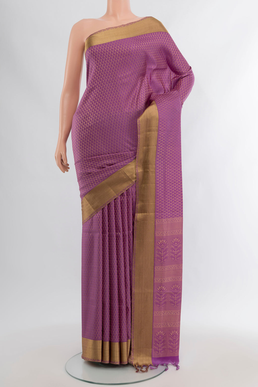 Purple Soft Silk Saree with Zari Butta on the body and Zari Border.  displayed on a mannequin