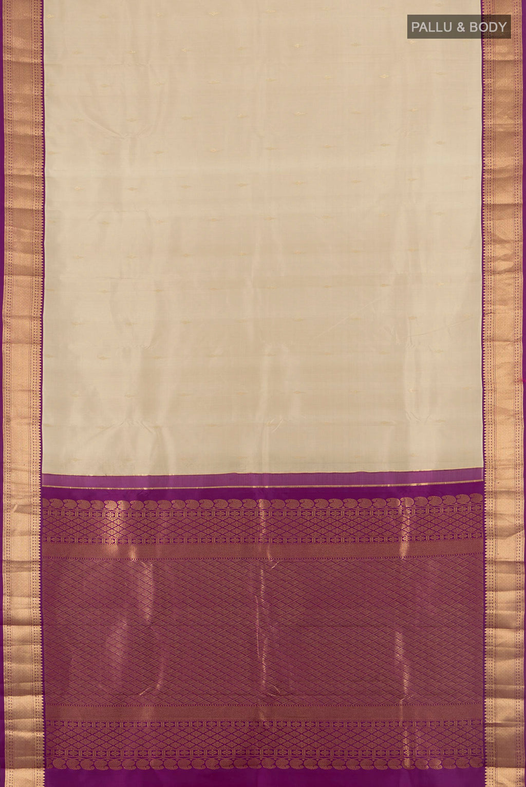 Flat view of Beige Kanchipuram Silk Saree with Zari Butta on the body and Zari Border. 