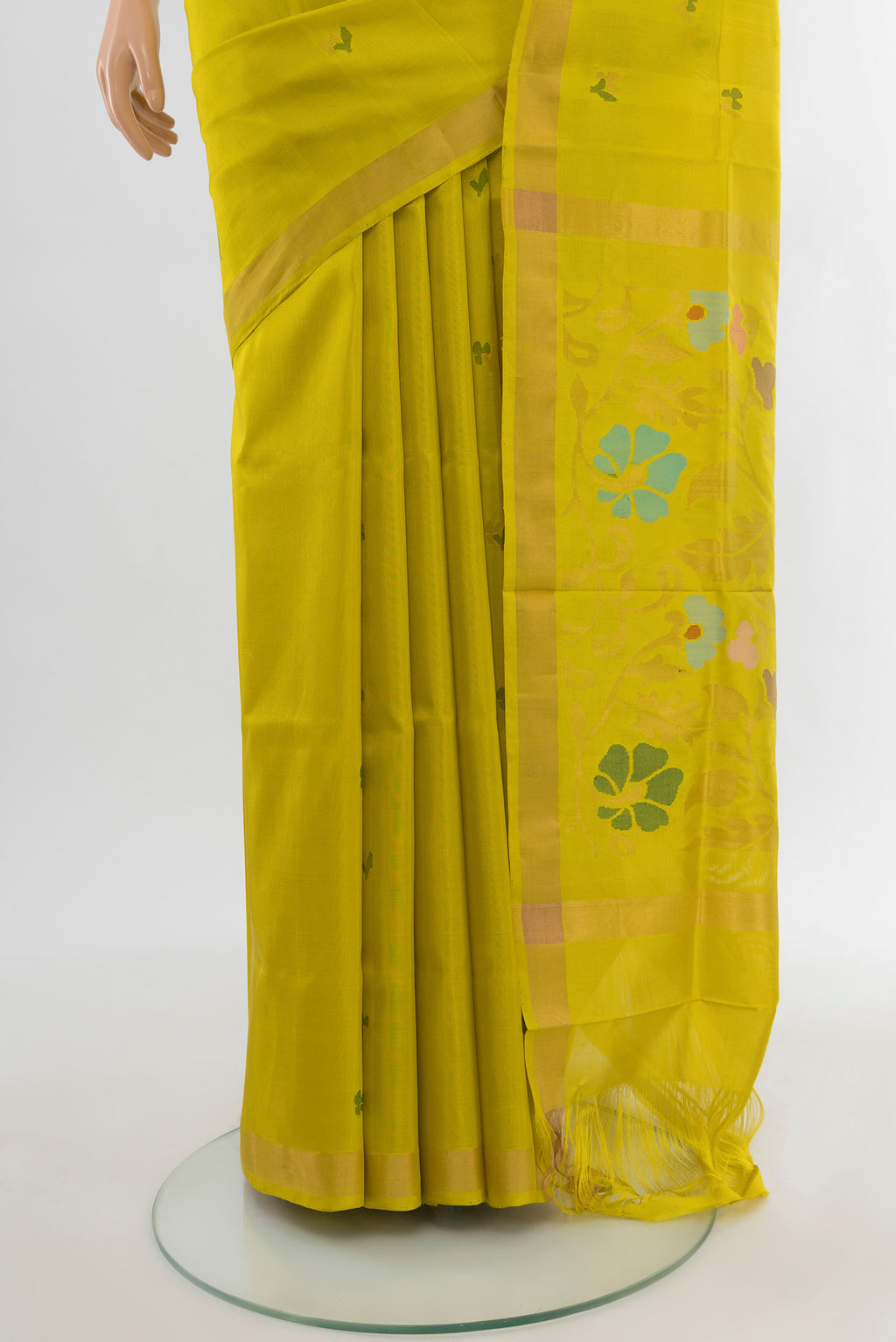 Pleats and pallu of Light Green Uppada Silk Saree with Zari Butta on the body and Silk Border. 