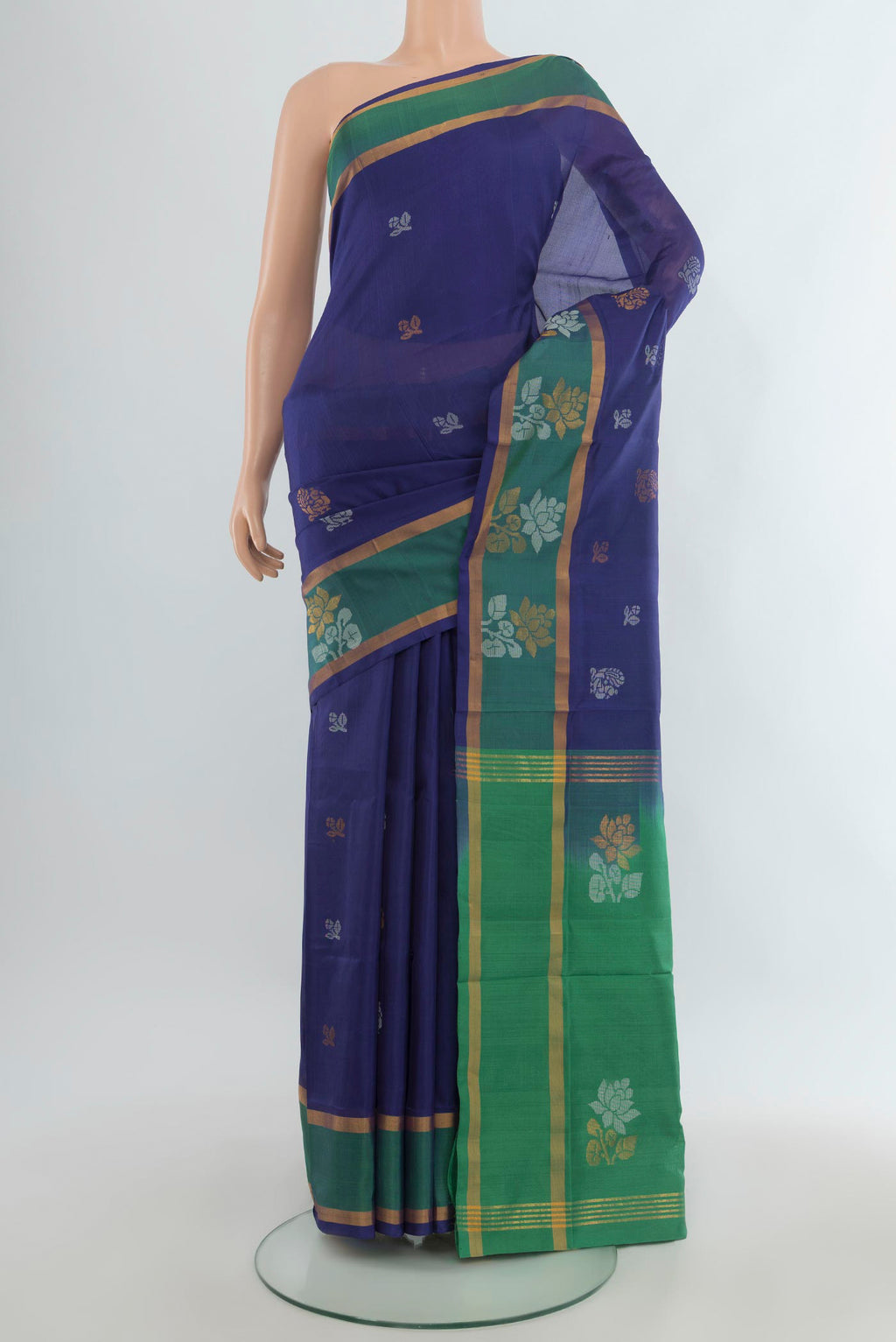 Pure Silk Blue Uppada Saree with Zari Butta on the body and Plain Border.  displayed on a mannequin