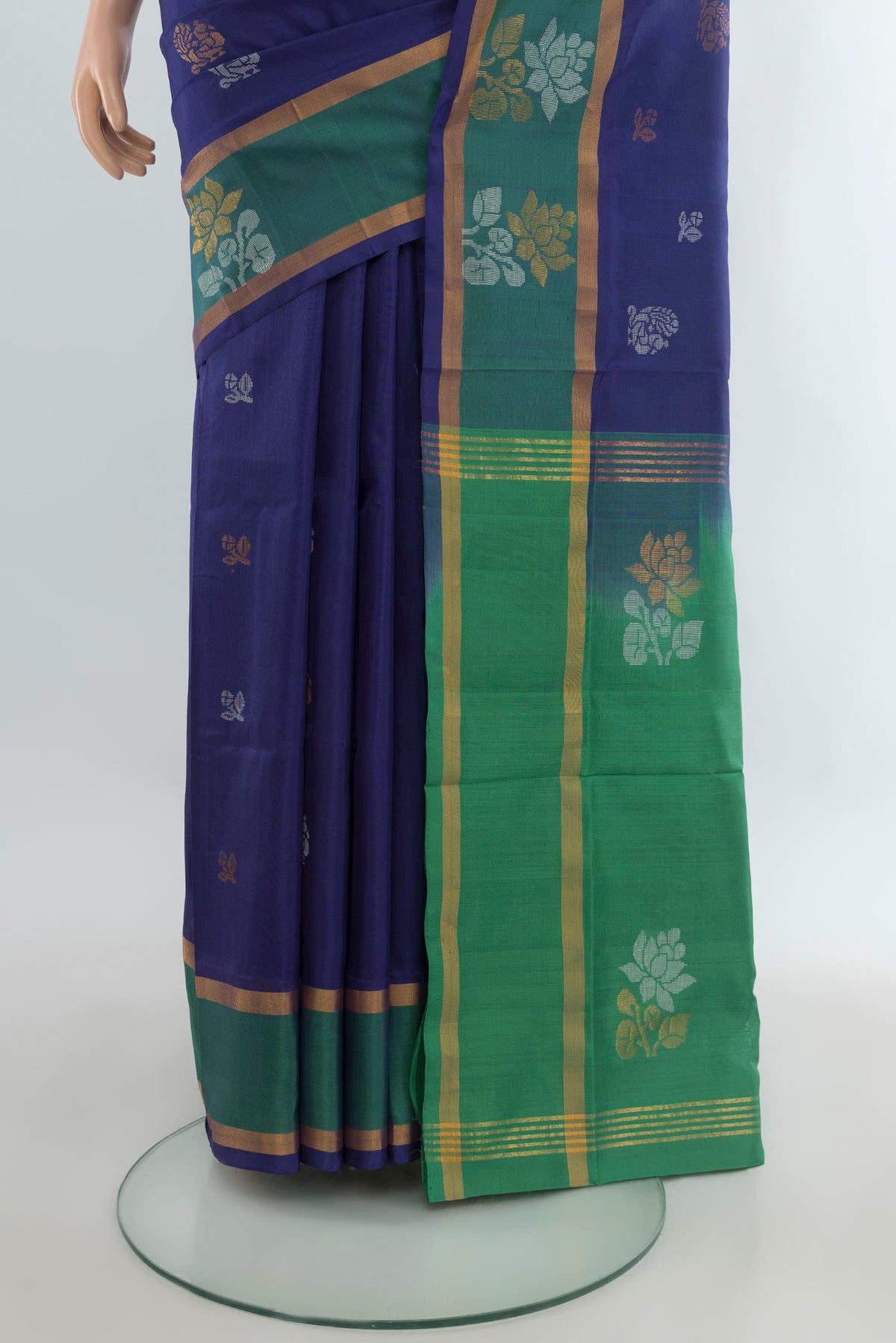 Pleats and pallu of Pure Silk Blue Uppada Saree with Zari Butta on the body and Plain Border. 