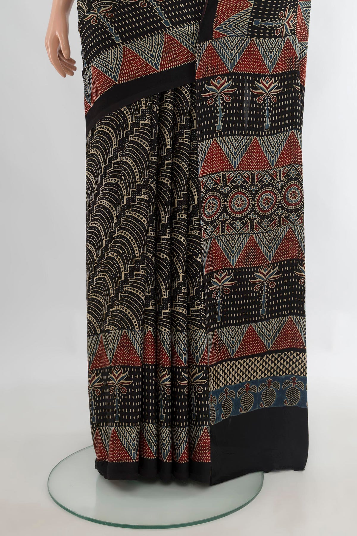 Pleats and pallu of Black Satin Crepe Saree with Floral Print on the body and Printed Border. 