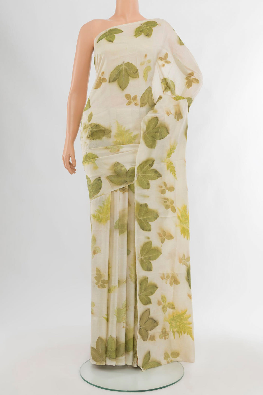 Off White Tussar Silk Saree with Floral Print on the body and Without Border.  displayed on a mannequin