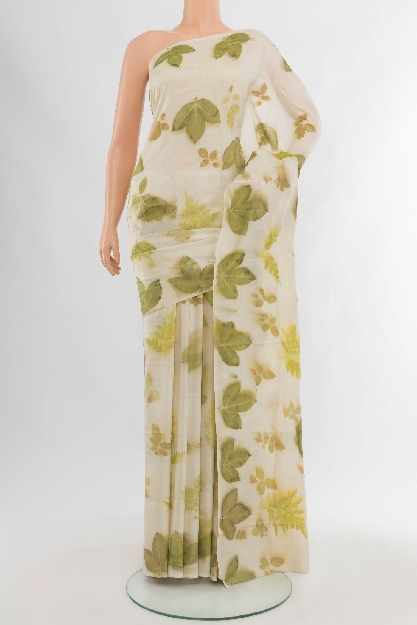 Off White Tussar Silk Saree with Floral Print on the body and Without Border.  displayed on a mannequin