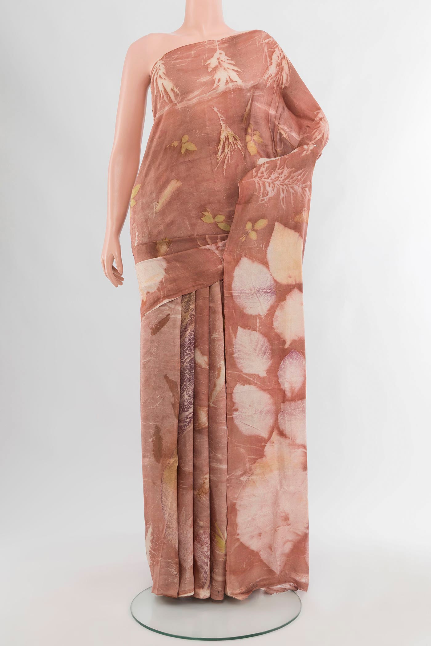 Mauve Tussar Silk Saree with Floral Print on the body and Without Border.  displayed on a mannequin
