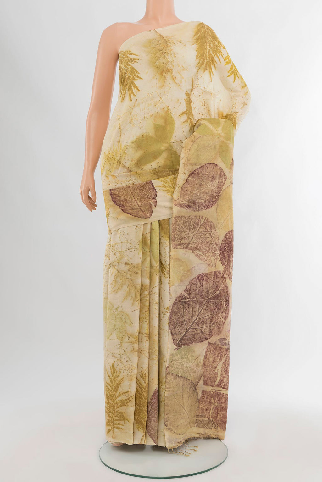 Cream Tussar Silk Saree with Floral Print on the body and Without Border.  displayed on a mannequin