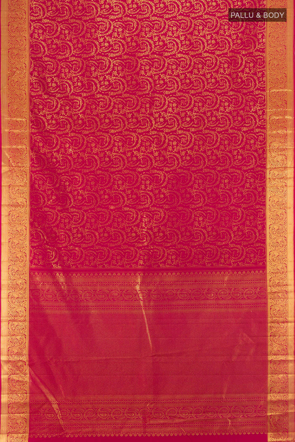 Flat view of Dark Pink Kanchipuram Silk Saree with Zari Brocade on the body and Zari Border. 