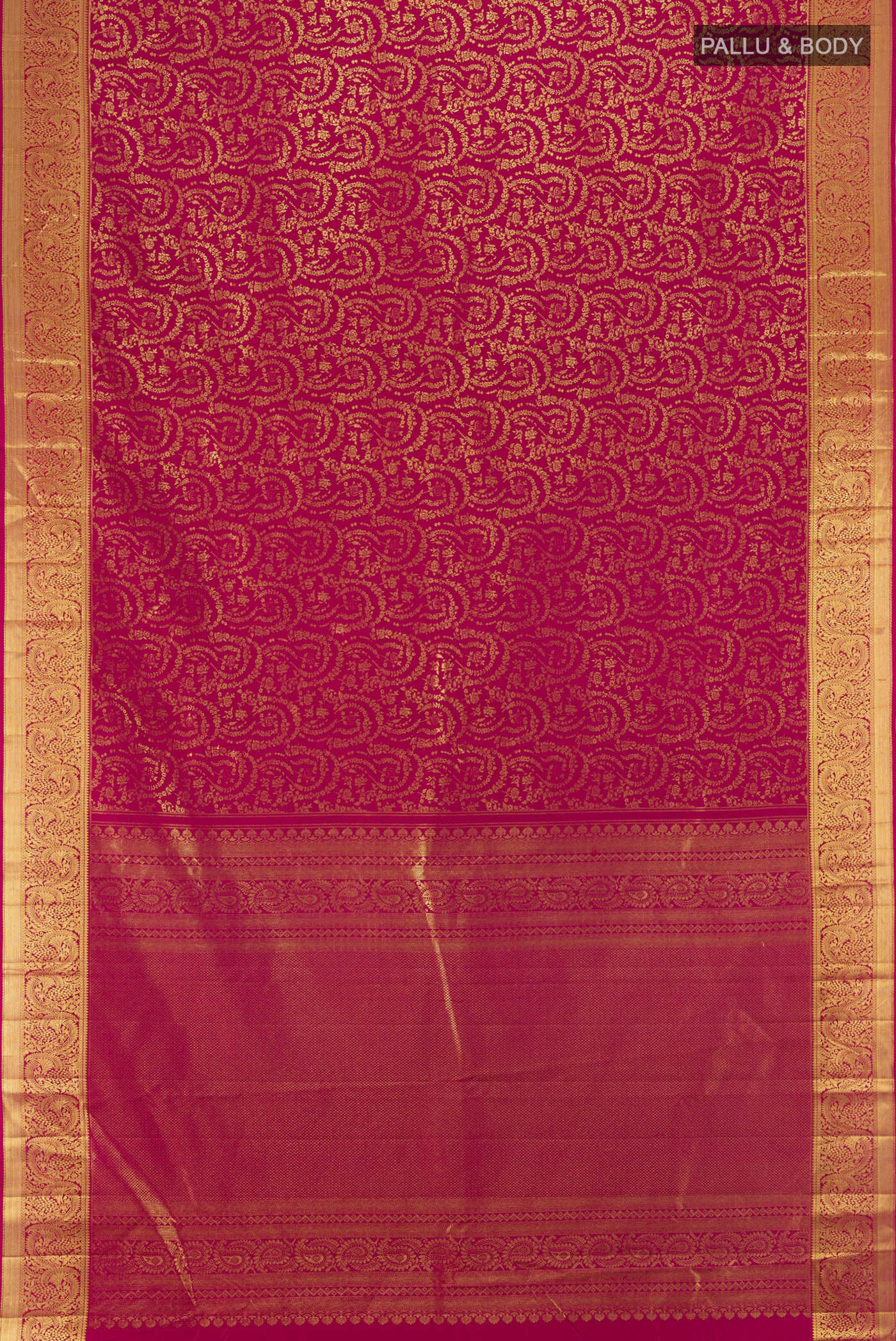 Flat view of Dark Pink Kanchipuram Silk Saree with Zari Brocade on the body and Zari Border. 