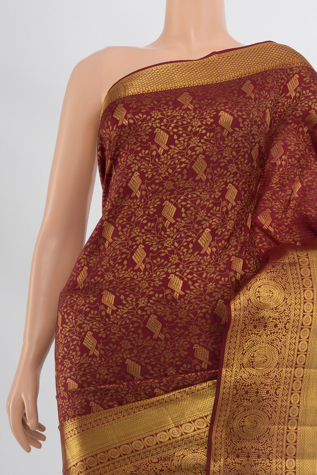 Border image of Pure Silk Pure Zari Maroon Kanchipuram Saree with Zari Butta on the body and Silk Border. 