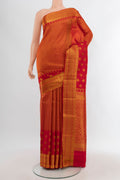 Red Kanchipuram Silk Saree with Zari Brocade on the body and Zari Border.  displayed on a mannequin