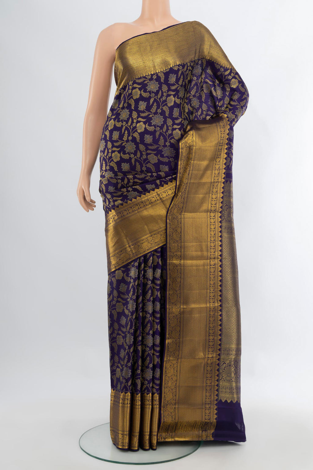 Navy Blue Kanjivaram Silk Saree with Zari Brocade on the body and Zari Border.  displayed on a mannequin