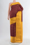 Coffee Brown Kanjivaram Silk Saree with Zari Brocade on the body and Zari Border.  displayed on a mannequin