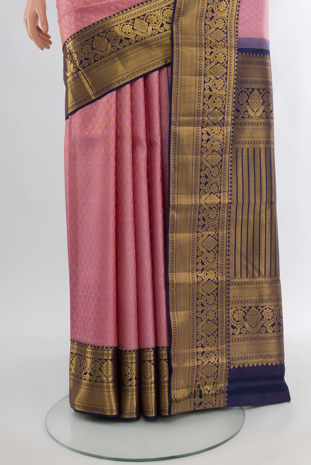 Pleats and pallu of Pure Silk Pure Zari Rose Gold Kanjivaram Saree with Zari Butta on the body and Silk Border. 