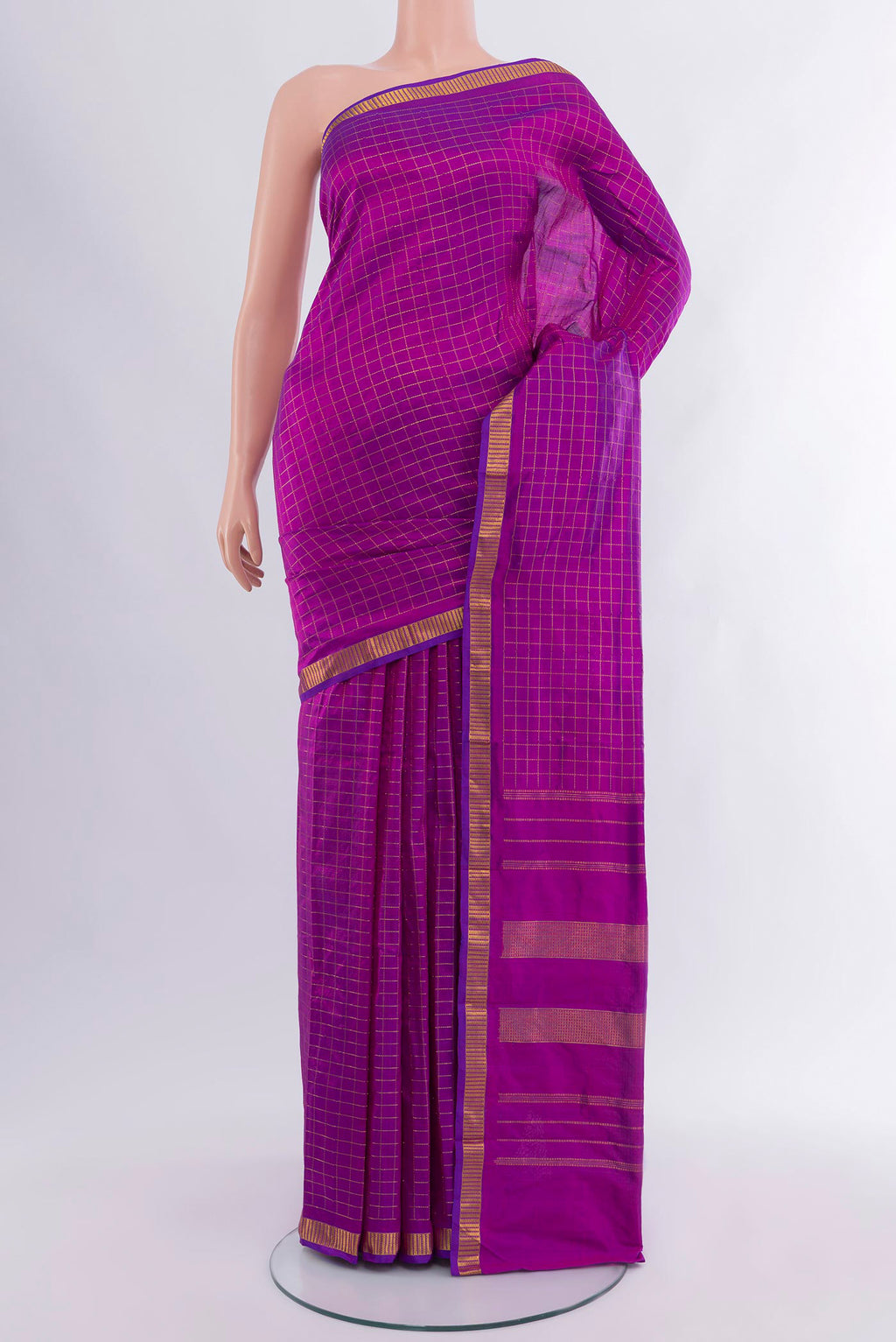 Purple Kanjivaram Silk Saree with Checked design on the body and Zari Border.  displayed on a mannequin