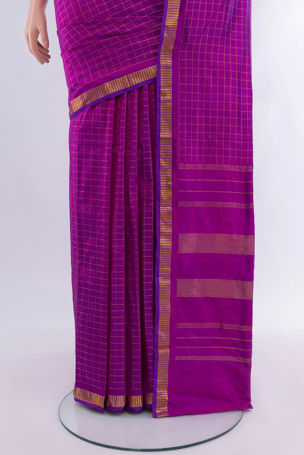 Pleats and pallu of Purple Kanjivaram Silk Saree with Checked design on the body and Zari Border. 