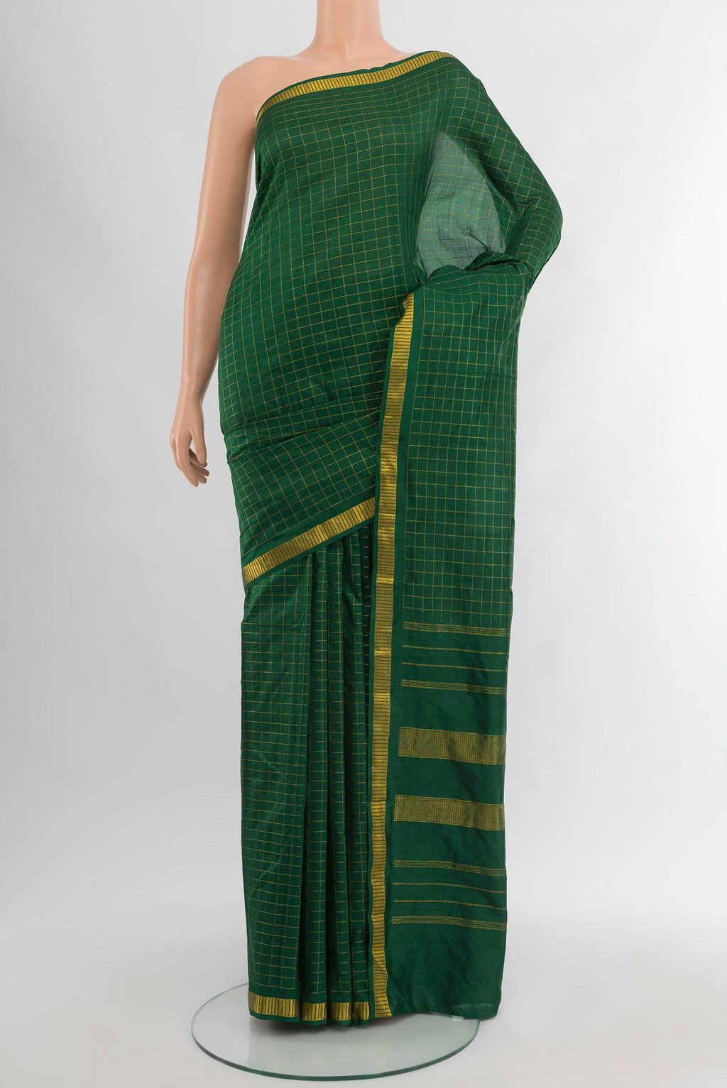 Bottle Green Kanjivaram Silk Saree with Checked design on the body and Zari Border.  displayed on a mannequin