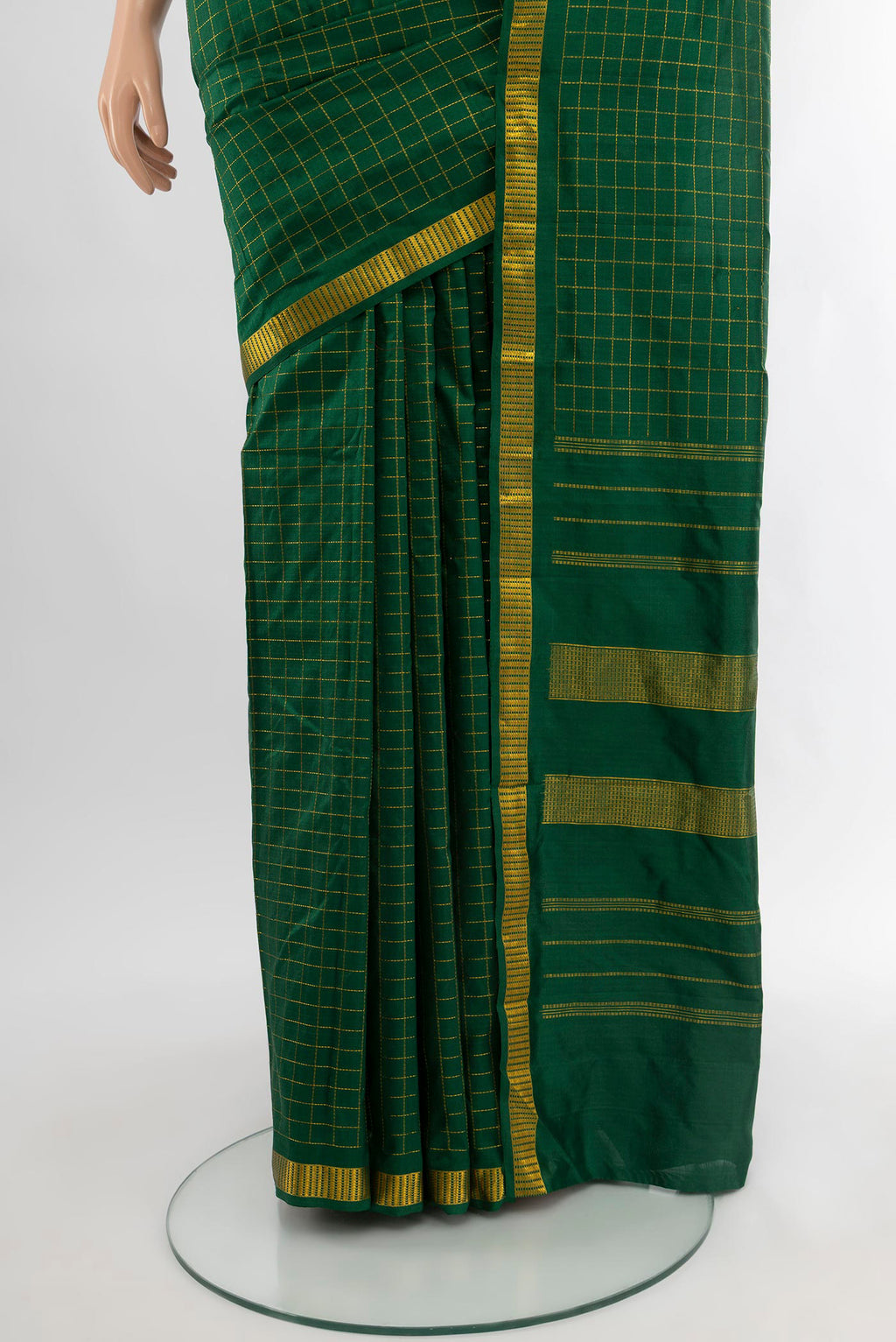 Pleats and pallu of Bottle Green Kanjivaram Silk Saree with Checked design on the body and Zari Border. 