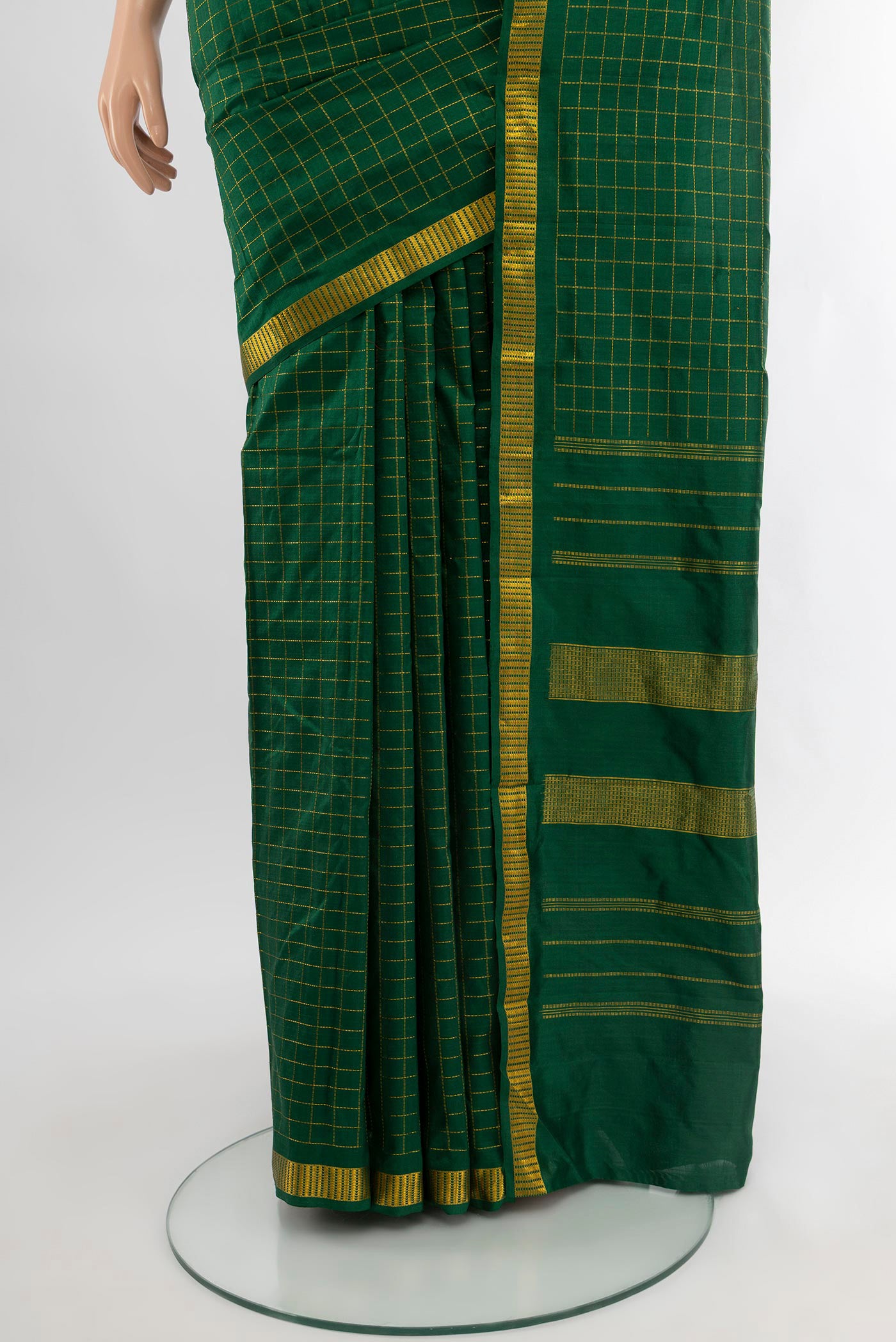 Pleats and pallu of Bottle Green Kanjivaram Silk Saree with Checked design on the body and Zari Border. 